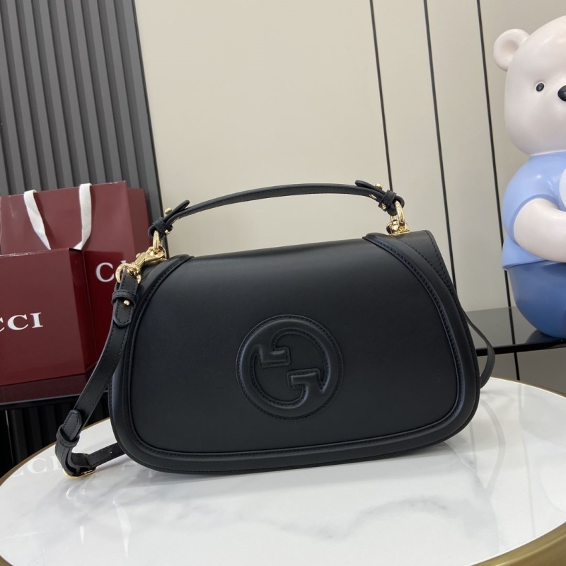 G*u*i top handle bags